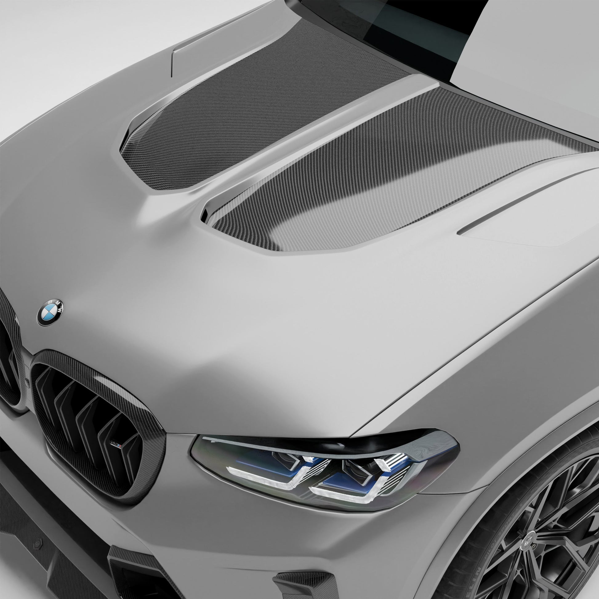 Close-up of a BMW car hood with visible logo