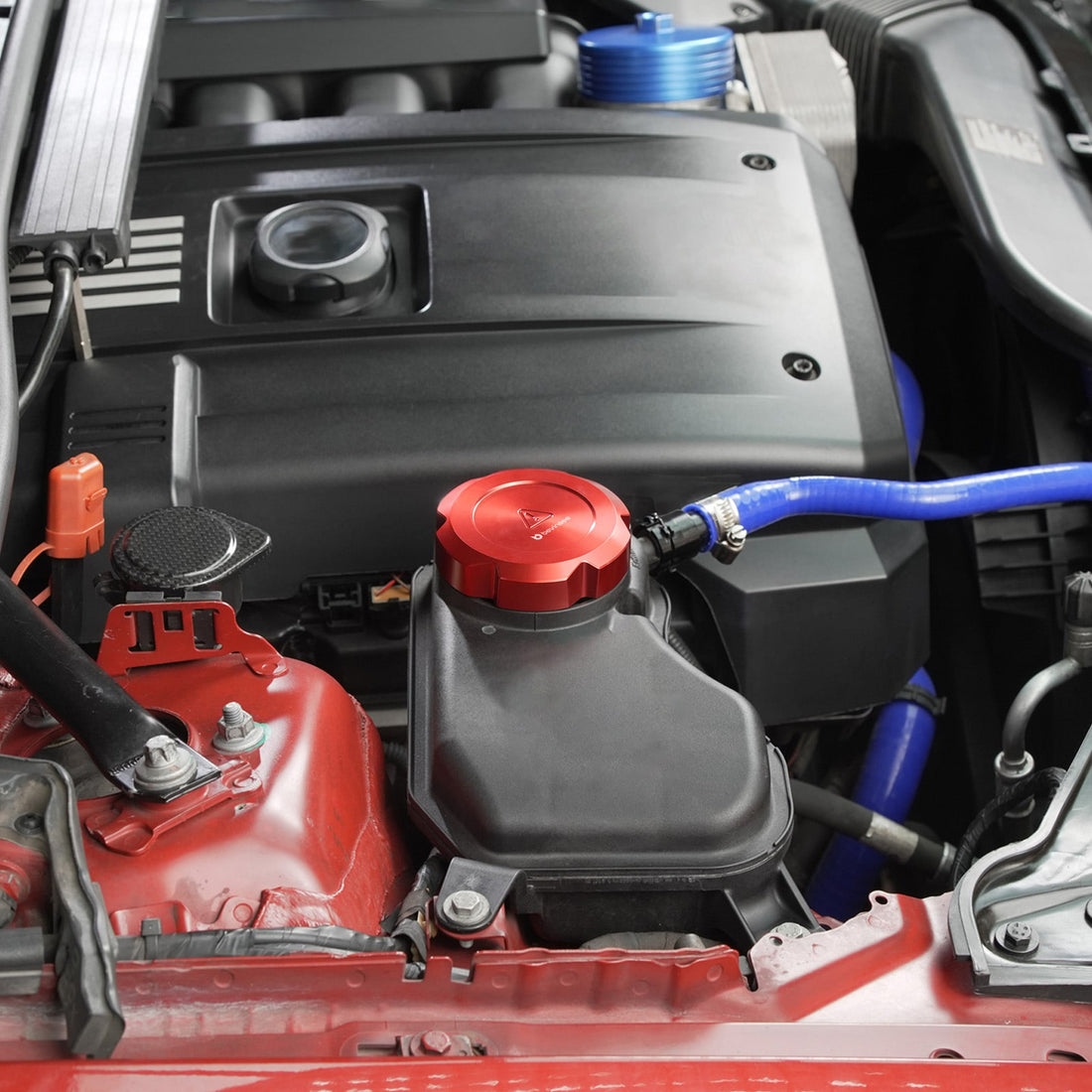 installed-bevinsee-aluminum-coolant-cap-bmw-e92-335i-engine-bay
